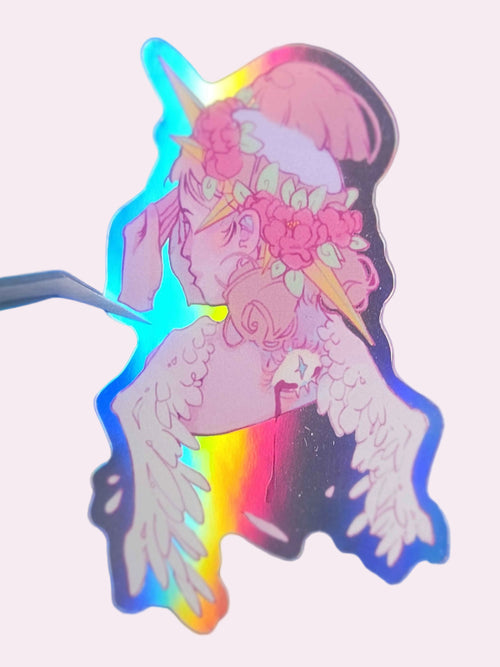 Angel No-See Die-Cut Sticker — approximately 3 inch waterproof vinyl sticker featuring an original illustration of an angelic figure with an empty brain, a halo adorned with peonies, and a third eye on the back of the head bleeding tears, a symbolic play on Monkey No-See by indie artist Ailyse of Finding Wonderland, part of the Signature Collection