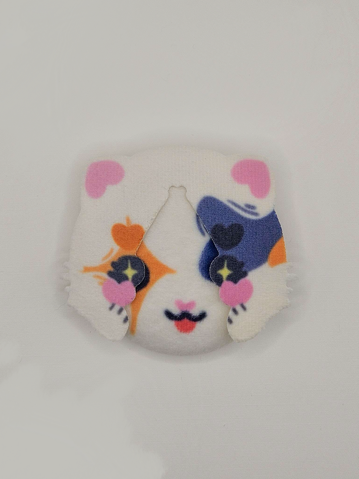Harlequin Cat Plush Button Pin — plush pin, Little Wonders collection