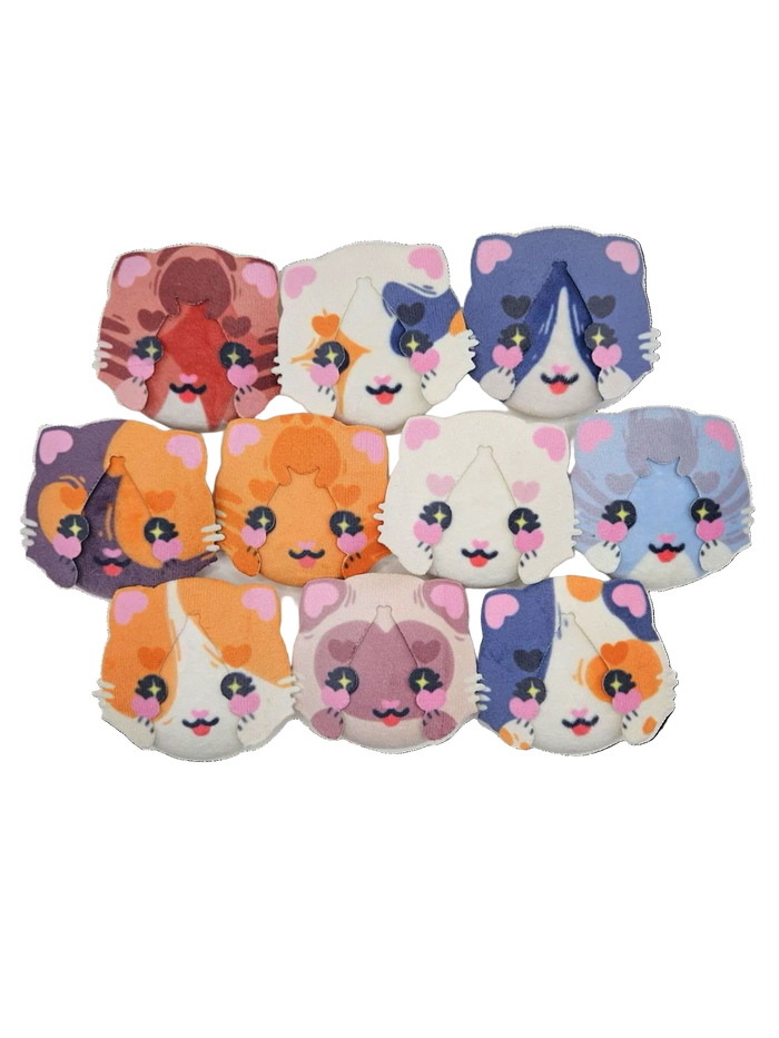 All ten Cat Plush Button Pin colorways from the Little Wonders collection, shown together