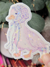 Close-up of Wander Goose sticker showing hand-drawn gingham pattern and ribbon detail