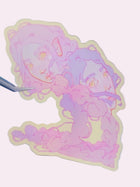 Marche Droit Die-Cut Sticker — approximately 3 inch waterproof vinyl sticker featuring an original abstract illustration of two figures connected by braids that loop between them into infinity, a symbolic artwork about legacy, love, and walking straight, by indie artist Ailyse of Finding Wonderland, part of the Signature Collection