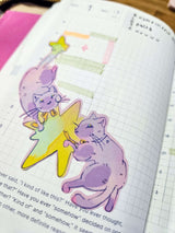 Little Wonders sticker sheets by Finding Wonderland styled flat lay showing Double Lucky and Funny Bunny space sticker sheets alongside collection items