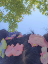 Hairclips worn in hair, shown outdoors alongside other Little Wonders hairclip designs