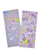 Until I Meet You and Until You Meet Me sticker sheets — holographic Little Wonders collection sticker sheets featuring Double Lucky the bunny and Funny Bunny the cat floating through a starry night sky, original artwork by indie artist Ailyse of Finding Wonderland
