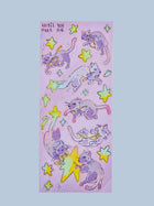 Until You Meet Me holographic sticker sheet featuring Funny Bunny the space cat drifting through stars in shades of lavender and green, Little Wonders collection by indie artist Ailyse of Finding Wonderland — 3 by 7 inch vinyl-like sticker sheet